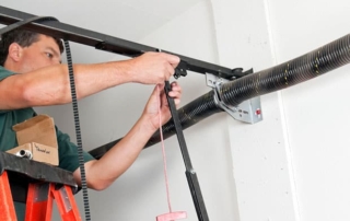 Torsion Springs vs. Extension Springs: What’s the Difference?