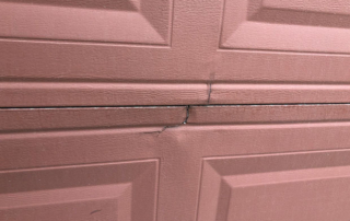 How Do You Fix a Dented Garage Door?