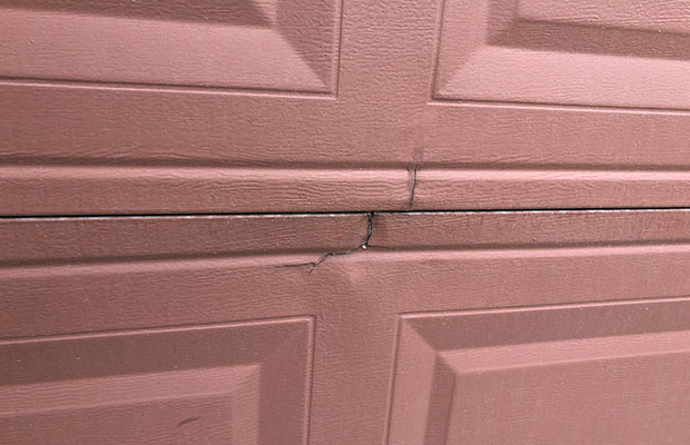 How Do You Fix a Dented Garage Door?