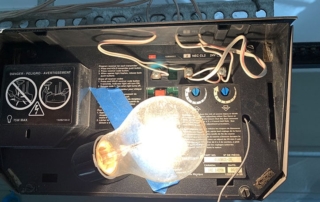 Closeup of garage door opener.
