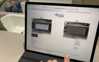 Laptop showing custom garage door layout on home.