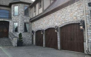 Picture of new garage doors on new house.
