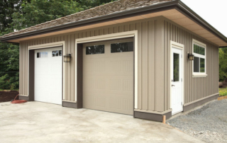 Picture of detached garage with two doors.