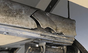 Closeup of Broken Garage Door Seal